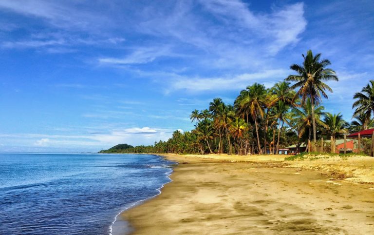 tropical-beach-sand-sea-sky-palms