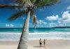The Pros and Cons of Living in Tropical Countries tropics-beach-sea-palm-couple