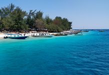 Living in the Gili Islands as an Expat Boats on a beach in the Gili Islands